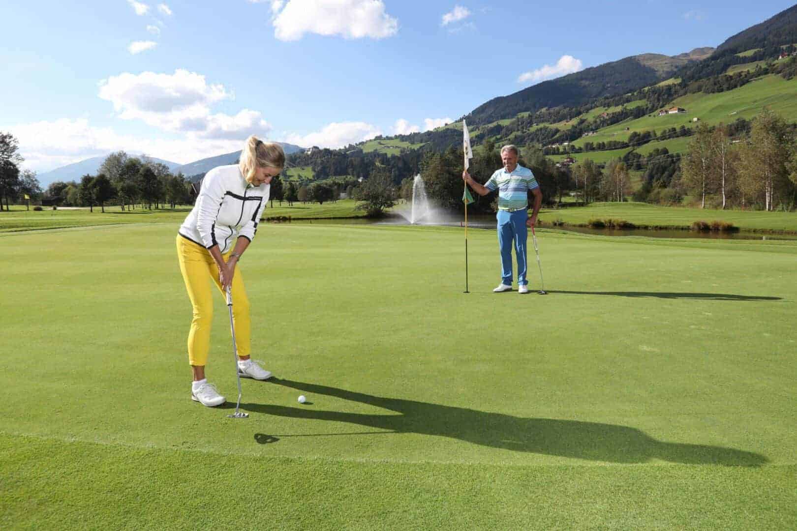 Golfers on a Well-Maintained Golf Course in the Hohe Tauern National Park.